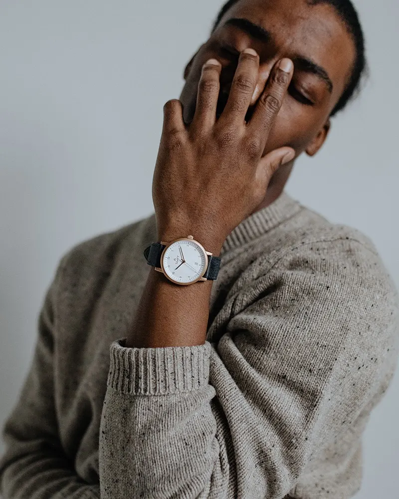 A rose gold Aspect on navy leather, worn with a flecked knit